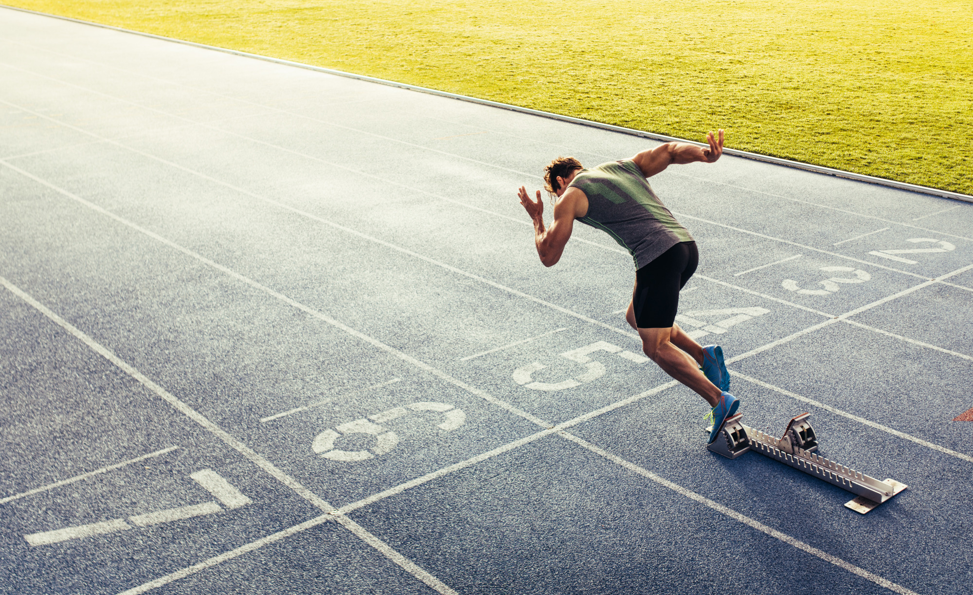 Photomural Sprinter On The Race Track During
