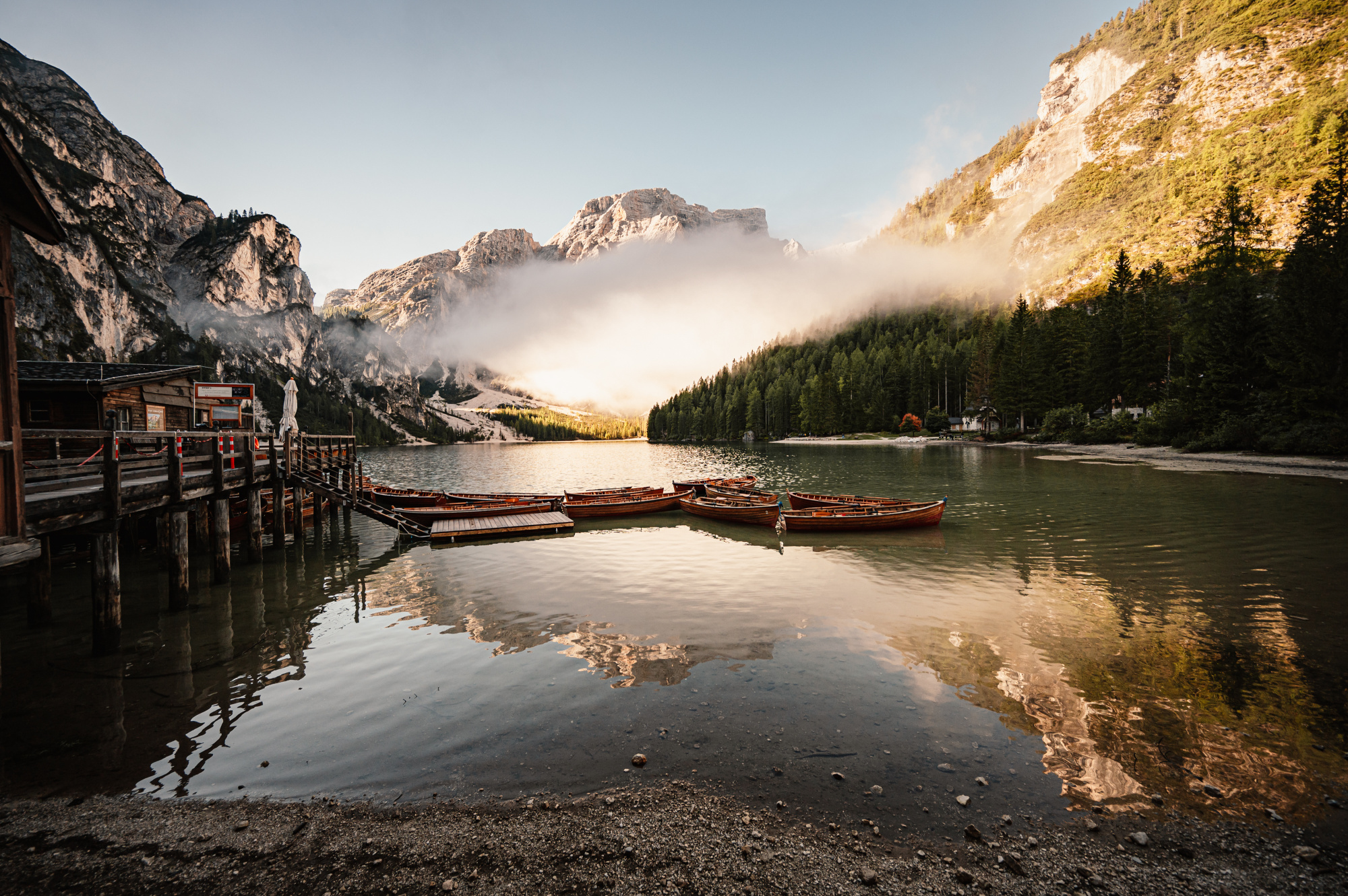 Photomural Boats On The Braies Lake, Pragser Wildsee In Dolomites Mountains, Sudtirol, Italy Dolomite.